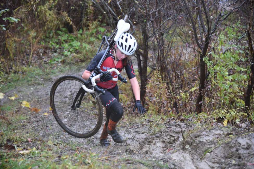 Melinda Wetzel at a muddy runup during a NYCross race called Wicked Creepy in Bennington, Vt., in August 2019. (Kristy Race photo)