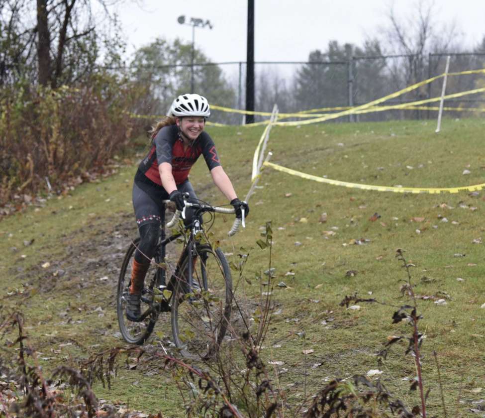 Melinda Wetzel during a NYCross race called Wicked Creepy in Bennington, Vt., in August 2019. She was smiling despite competing on a rainy, cold and muddy day, Wetzel said. (Kristy Race photo)