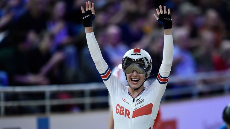 Barker celebrates after winning the women's 25km points final at the UCI track cycling World Championship