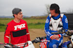 Rob Warner and Loic Bruni chat beside a motocross track in France.