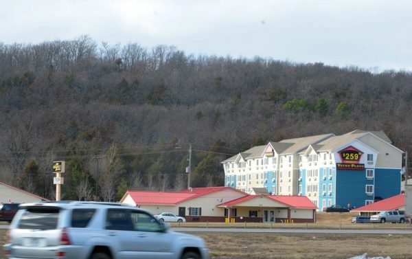 Millsap Mountain is seen looking west over commercial properties on Shiloh Drive and north of Martin Luther King Jr. Boulevard on Feb. 15, 2018, in Fayetteville. The City Council approved projects Tuesday to get going on the first phase of the Centennial Park buildout. (File photo/NWA Democrat-Gazette/David Gottschalk) story.lead_photo.caption