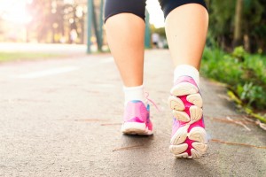 Photo Of Woman Wearing Pink Sports Shoes Walking 1556710 (1)
