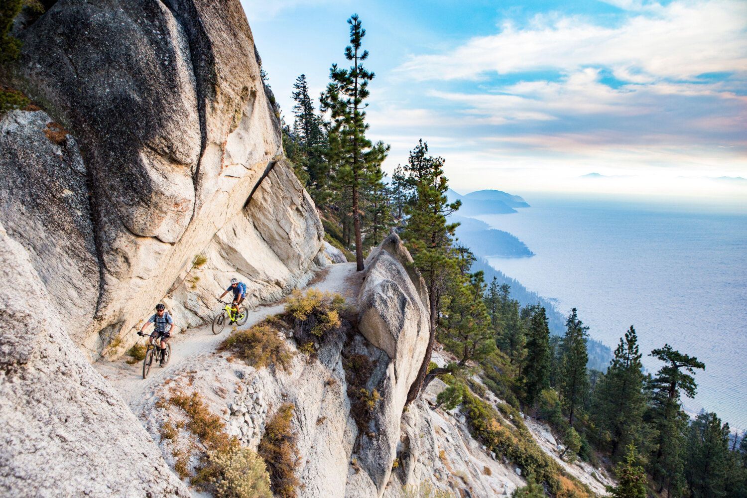 2db7ea6 mountain bikers travel along the scenic flume trail at lake tahoe