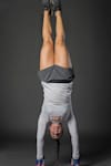 BMX race athlete Mariana Pajón does a handstand to show her gymnastic abilities.