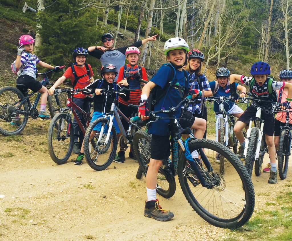 Mountain biking is awesome! Nederland kids ride the trails with Singletrack Mountain Bike Adventures (SMBA). See story page 11. PHOTO COURTESY OF SMBA